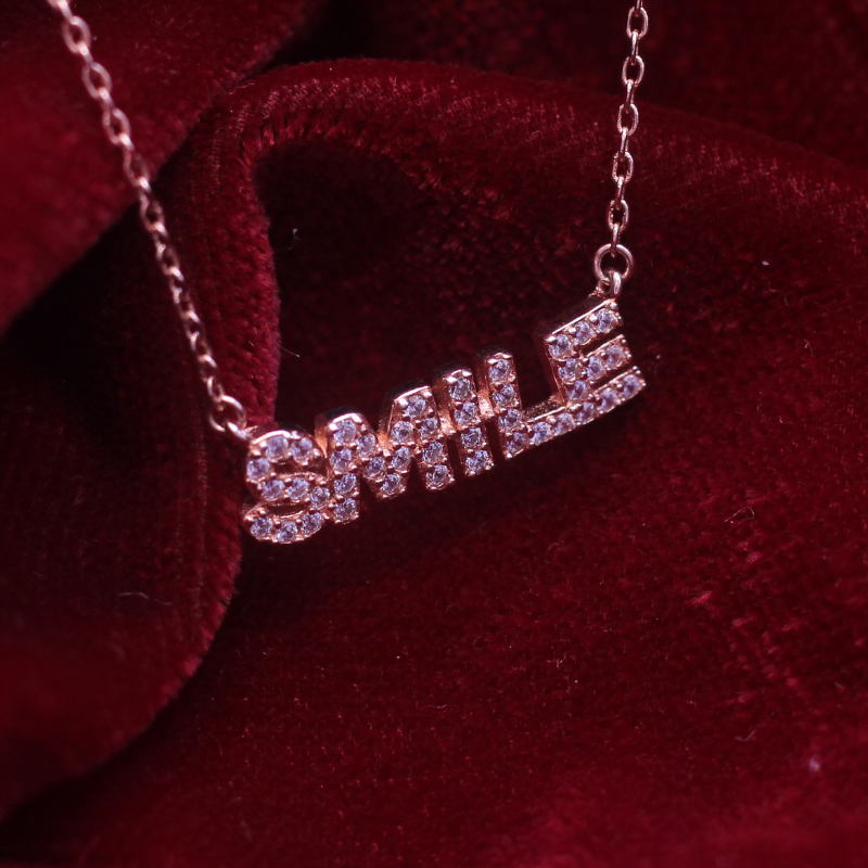 Reeva's 925 sterling silver ‘SMILE’ Pendant Necklace with Rose Gold