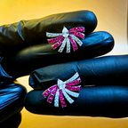 Reeva 's CZ Earrings with Ruby accent